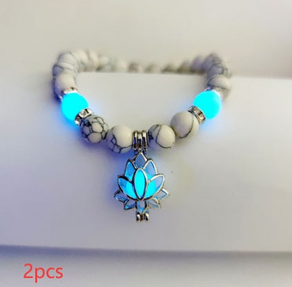 Glow in the dark lotus bracelet two-piece pale marbled set with blue glow, with 8 mm real-stone beads, elastic fit, a silver-color lotus, and light-charged accents for daily style.