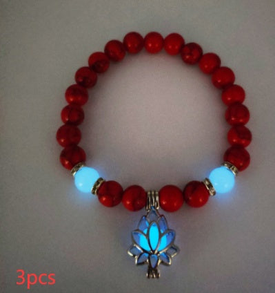Glow in the dark lotus bracelet three-piece red stone set with a blue glow, with 8 mm real-stone beads, elastic fit, a silver-color lotus, and light-charged accents for a dim view.