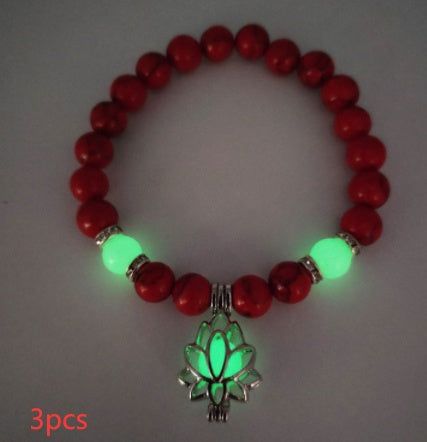 Glow in the dark lotus bracelet three-piece red stone set with green glow, with 8 mm real-stone beads, elastic fit, a silver-color lotus, and light-charged accents for daily style.