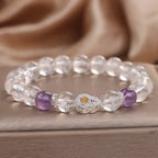 Healing crystal bracelet with purple gemstone accents and sparkling beads for calming daily energy support