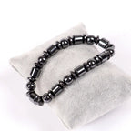 Hematite bracelet displayed with glossy black gemstone beads, grounding energy jewelry for modern style appeal