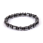 Hematite bracelet with polished black gemstone beads in a minimalist stretch design, grounding crystal jewelry for everyday style and energy balance