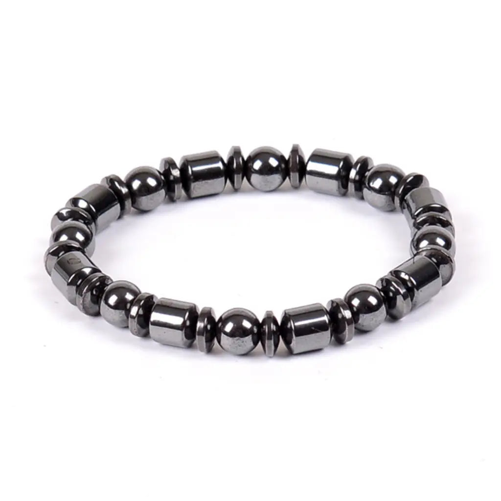 Hematite bracelet with polished black gemstone beads in a minimalist stretch design, grounding crystal jewelry for everyday style and energy balance
