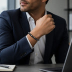 Hematite bracelet worn with business attire adding sleek gemstone jewelry for professional style confidence