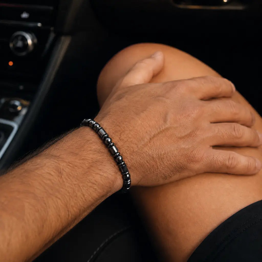 Hematite bracelet shown during everyday driving lifestyle adding modern gemstone accessory sophistication
