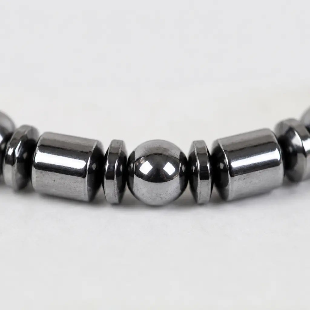 Hematite bracelet closeup with polished black gemstone beads showing premium craftsmanship and refined style