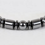 Hematite bracelet closeup with polished black gemstone beads showing premium craftsmanship and refined style