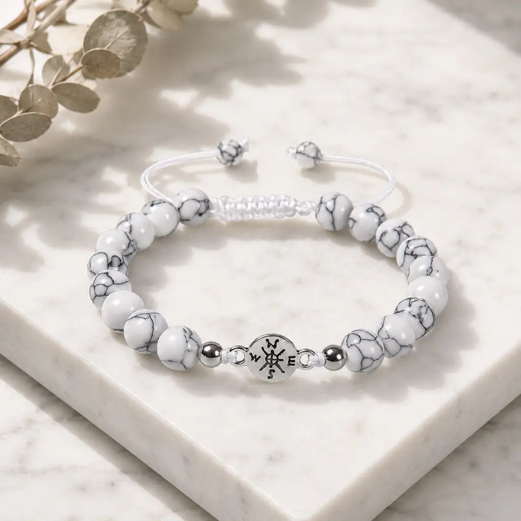 Howlite bracelet crafted with smooth white stone beads and silver accents for elegant calming energy wear