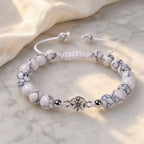 Howlite bracelet featuring polished marble beads and soft neutral styling for relaxing spiritual fashion