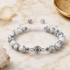 Howlite bracelet featuring polished gemstone beads and woven adjustable closure for peaceful meditation wear