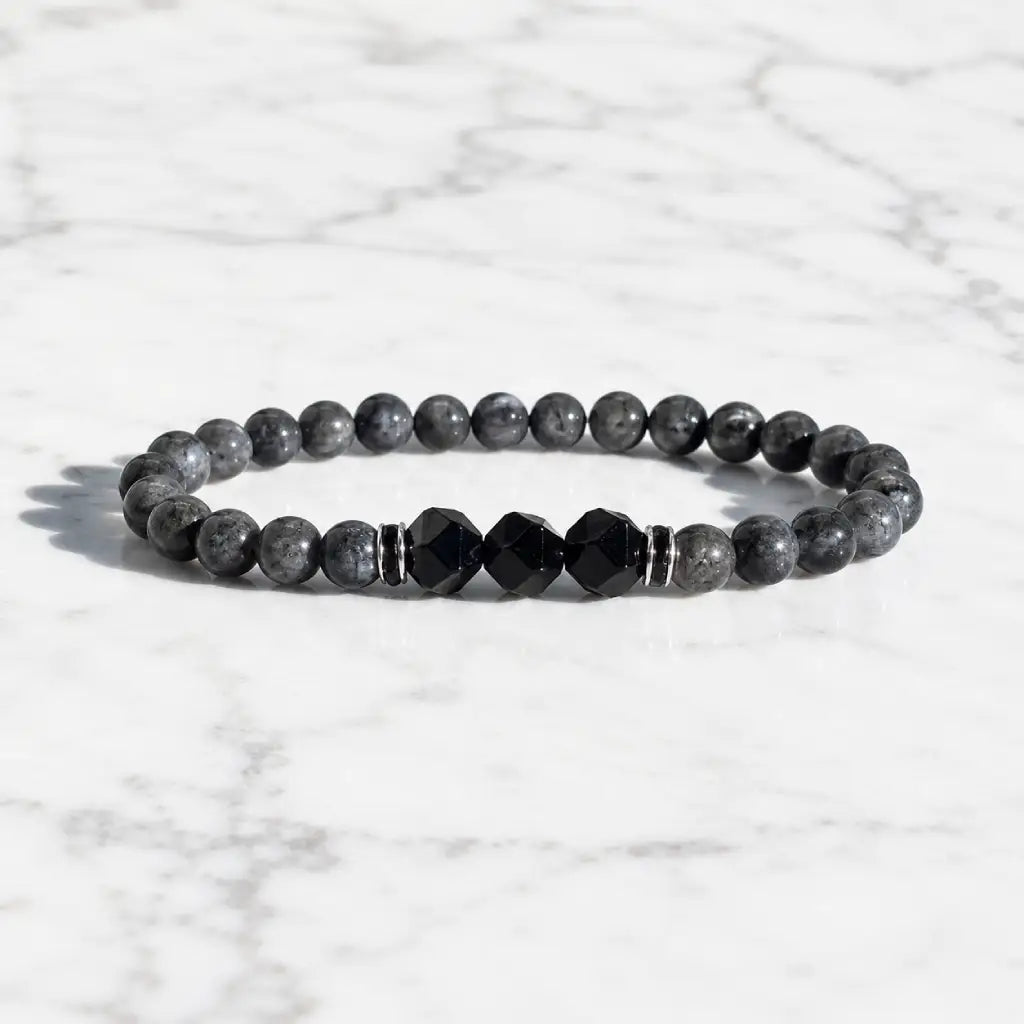 Labradorite and Obsidian bracelet crafted with polished gemstone beads for sleek everyday crystal fashion.
