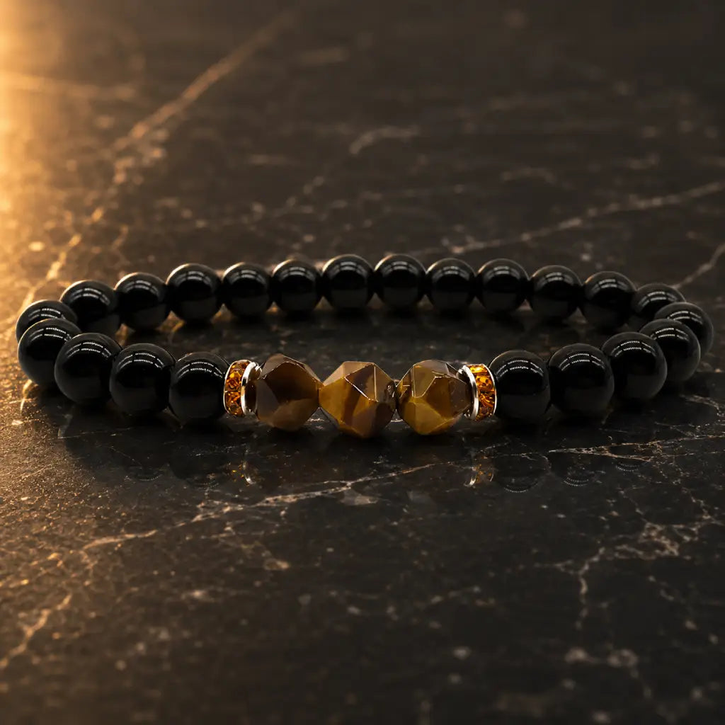 Labradorite and tiger eye bracelet on black marble with polished beads for premium crystal jewelry appeal