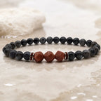 Labradorite crystal bracelet styled with neutral stone textures for elegant mindfulness and grounding protection
