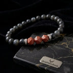 Labradorite crystal bracelet displayed on black marble with luxury gemstone accents for elegant spiritual style