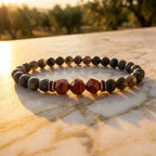 Labradorite crystal bracelet displayed in warm sunset light with faceted healing beads for calm focus