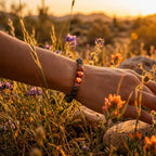 Labradorite crystal bracelet worn outdoors at sunset representing grounding energy and mindful natural healing