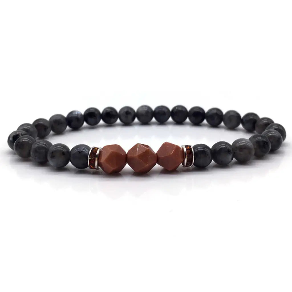Labradorite crystal beaded bracelet with faceted gemstone accents on white background for elegant grounding energy