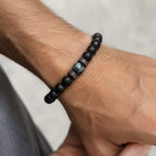 Labradorite men's bracelet featuring genuine labradorite gemstone, matte black beads, and wood spacers for everyday wear.