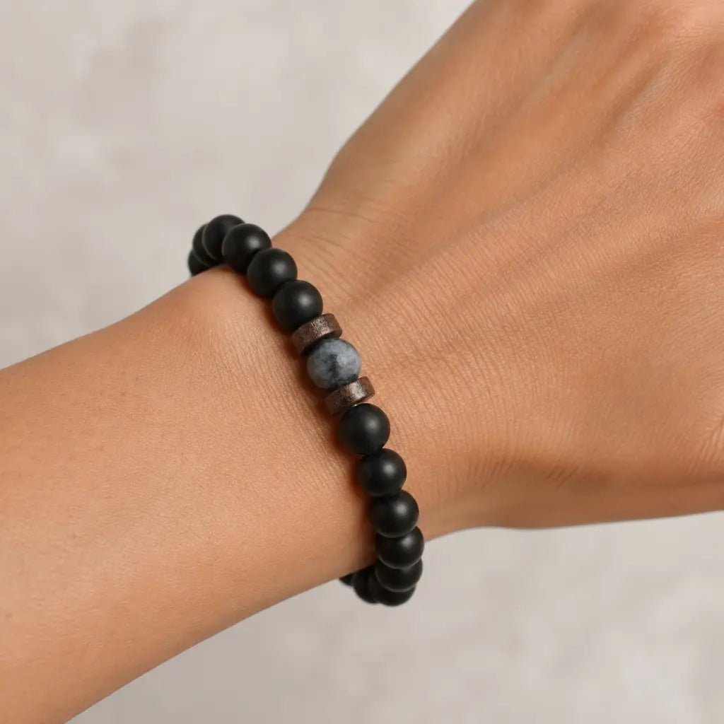 Labradorite matte bead bracelet featuring a natural labradorite gemstone, black stone beads, and wood spacers for minimalist everyday jewelry.