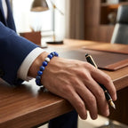 Lapis lazuli bracelet worn with a suit and pen, polished gemstone jewelry bringing confident executive style