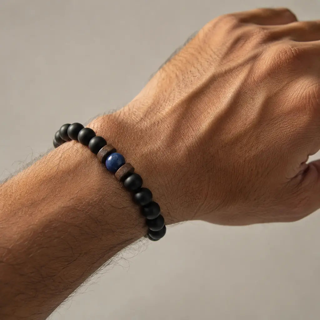 Lapis Lazuli onyx bracelet with matte black onyx beads and a natural blue lapis lazuli centerpiece, perfect for everyday minimalist style.