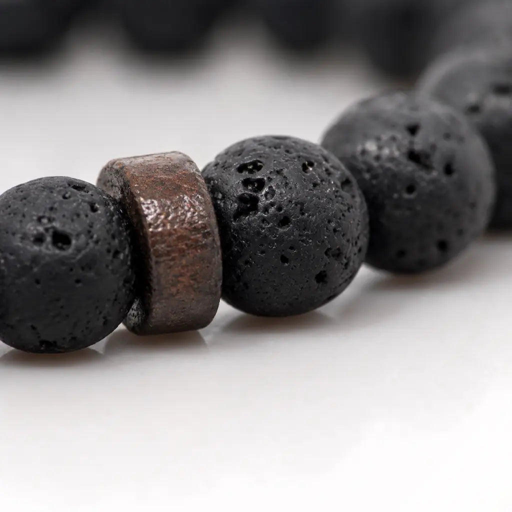 Lava labradorite bracelet detailed macro highlighting porous lava rock beads and handcrafted jewelry quality