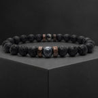 Lava labradorite bracelet showcased with volcanic rock beads and natural crystal centerpiece for everyday wear