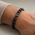 Lava labradorite bracelet worn casually with volcanic beads and natural gemstone accent for versatile styling