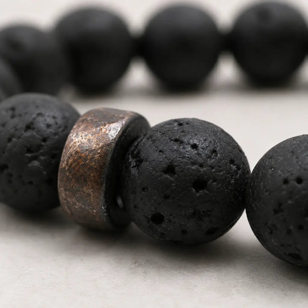 Lava labradorite bracelet close up featuring textured volcanic stone beads and artisan spacer accents