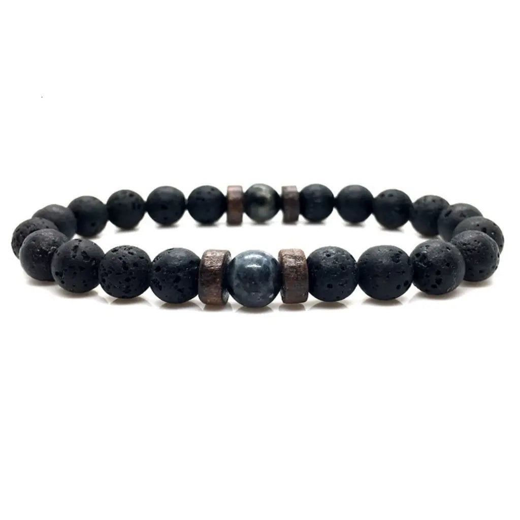 Lava labradorite bracelet isolated on white background featuring black lava beads and gemstone centerpiece