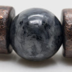 Lava labradorite bracelet macro view showing polished labradorite gemstone and decorative spacer bead details