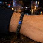 Lava Rock Lapis Lazuli bracelet close-up highlighting textured lava stone beads and natural blue lapis gemstone for premium handcrafted jewelry.