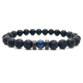 Lava Rock Lapis Lazuli bracelet displaying authentic volcanic lava beads and genuine blue lapis gemstone in a clean product presentation for premium jewelry.