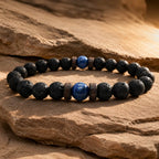 Lava Rock Lapis Lazuli bracelet crafted with natural volcanic stone beads and deep blue lapis gemstone in an elegant outdoor stone display.