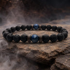 Lava Rock Lapis Lazuli bracelet featuring authentic volcanic stone beads and rich blue lapis centerpiece in a rugged natural setting.