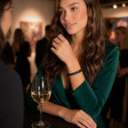 Lava Rock Lapis Lazuli bracelet showcased at a social gathering with natural lava stone beads and genuine lapis gemstone for versatile luxury jewelry.