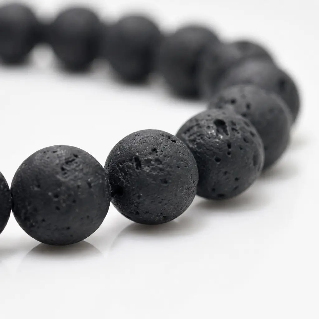 Lava Rock Lapis Lazuli bracelet close-up featuring textured volcanic stone beads with handcrafted detailing for premium men's gemstone jewelry.