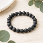 Lava stone bracelet black bead stretch bracelet on wood with eucalyptus, natural diffuser jewelry for calm style