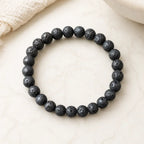 Lava stone bracelet black porous bead stretch bracelet on marble, grounding diffuser jewelry for easy daily wear