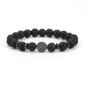 Lava stone bracelet isolated on white background showing volcanic bead jewelry for clean product visibility.