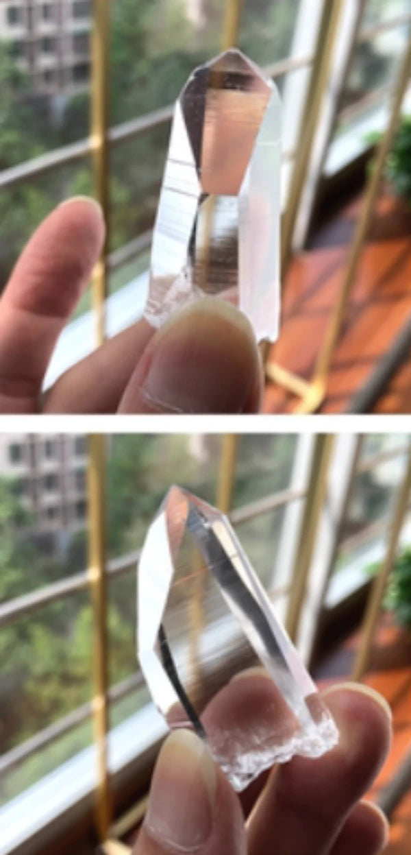 Lemurian transparent quartz crystal with sharp termination and signature etched lines, perfect for collectors and crystal photography.