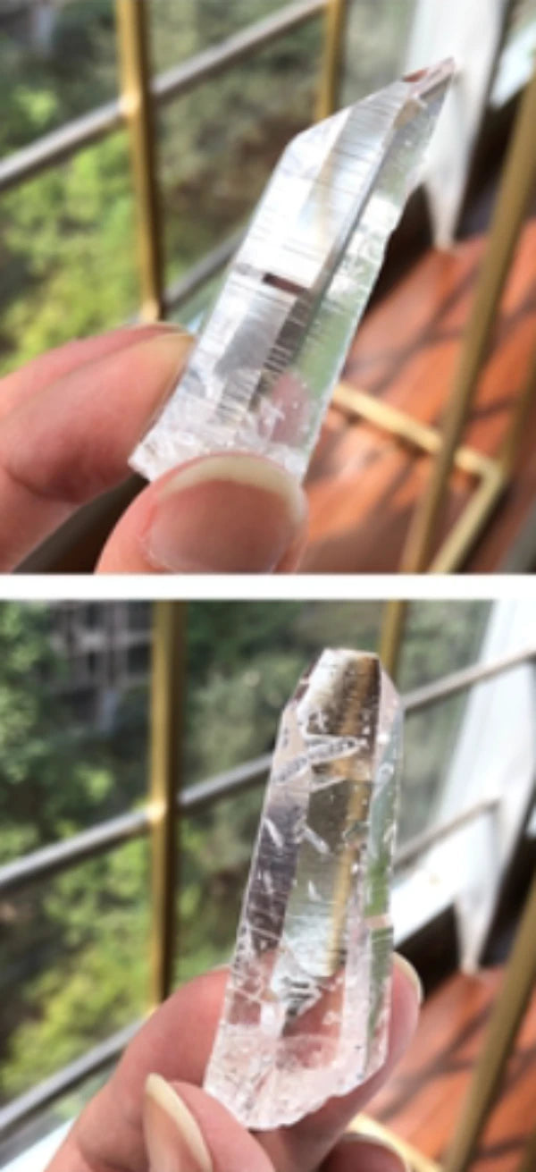 Lemurian natural quartz crystal featuring signature etched striations and polished faces, perfect for mineral collectors and healing collections.