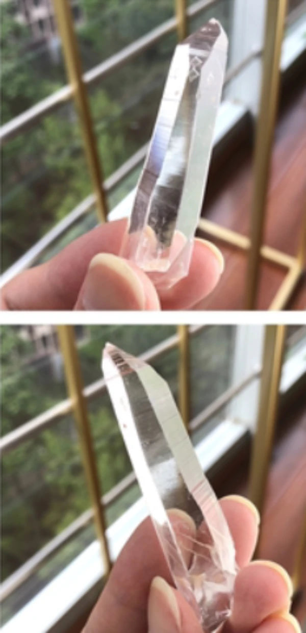 Lemurian clear crystal point showcasing natural etched faces and exceptional transparency, a premium quartz specimen for collectors.