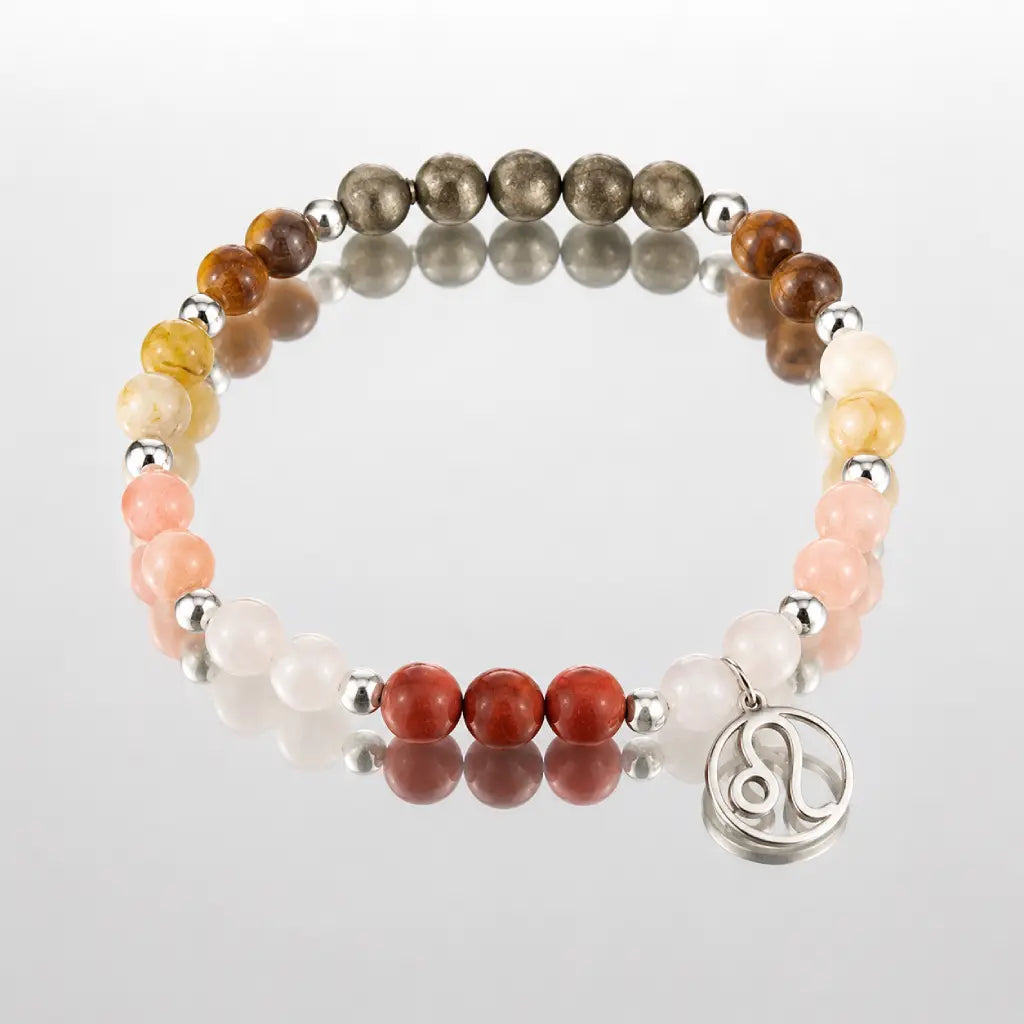 Leo crystal jewelry gemstone bracelet with zodiac charm showcased in reflective studio lighting highlighting premium craftsmanship.