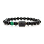 Leo zodiac bracelet with matte black beads and green accent stone, minimalist luxury design for confident everyday wear