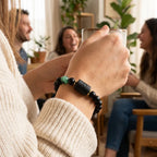 Leo zodiac bracelet with black beads and green gemstone, cozy lifestyle jewelry for relaxed confident everyday expression
