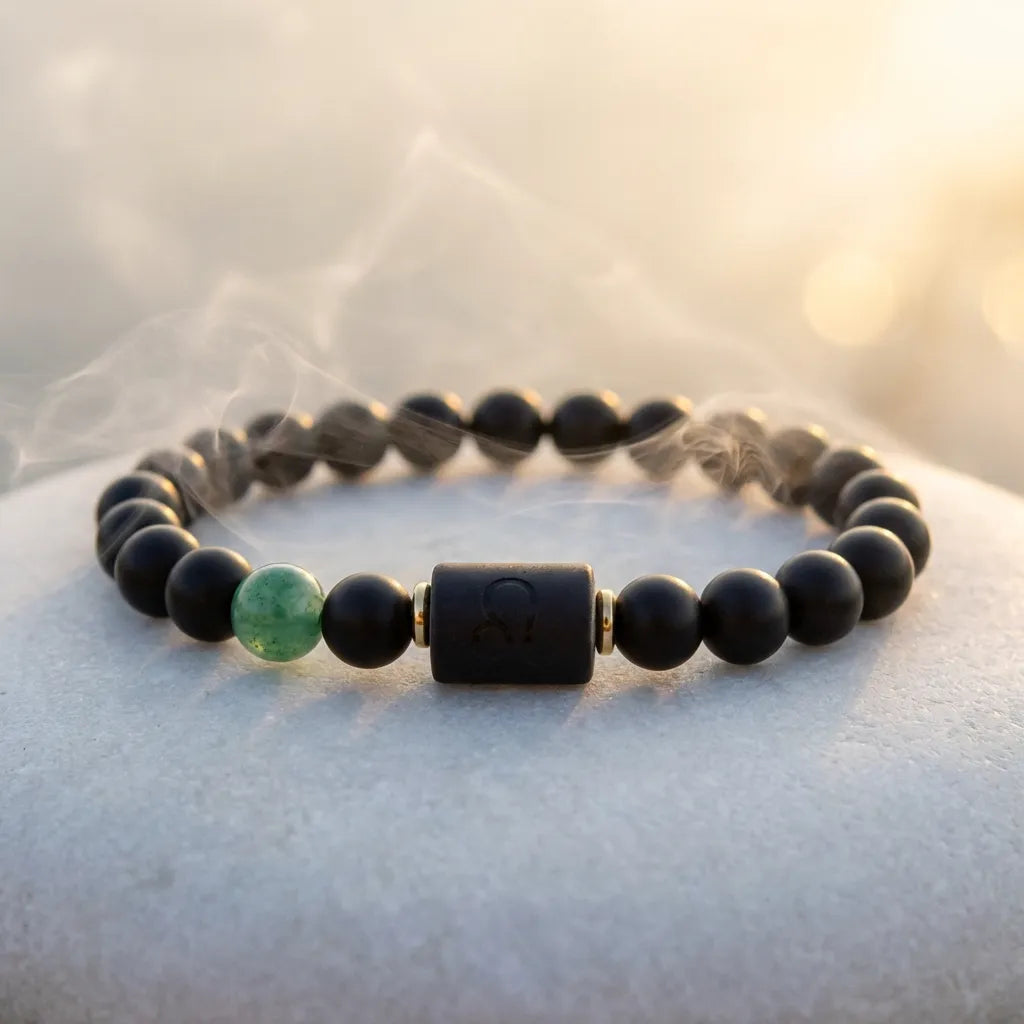 Leo zodiac bracelet featuring matte black beads and green accent, minimalist astrology jewelry for modern confident style