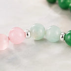 Libra zodiac Jewelry featuring polished rose quartz and pale green gemstone beads with silver accents for balanced style