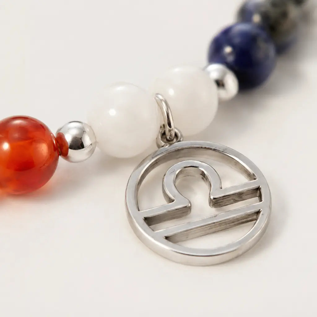 Libra zodiac Jewelry featuring silver Libra symbol charm with gemstone bracelet design for stylish zodiac expression