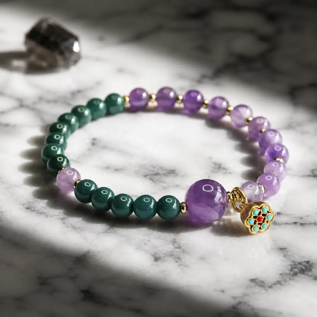Lotus bracelet featuring amethyst and green stone beads with premium healing jewelry aesthetic appeal